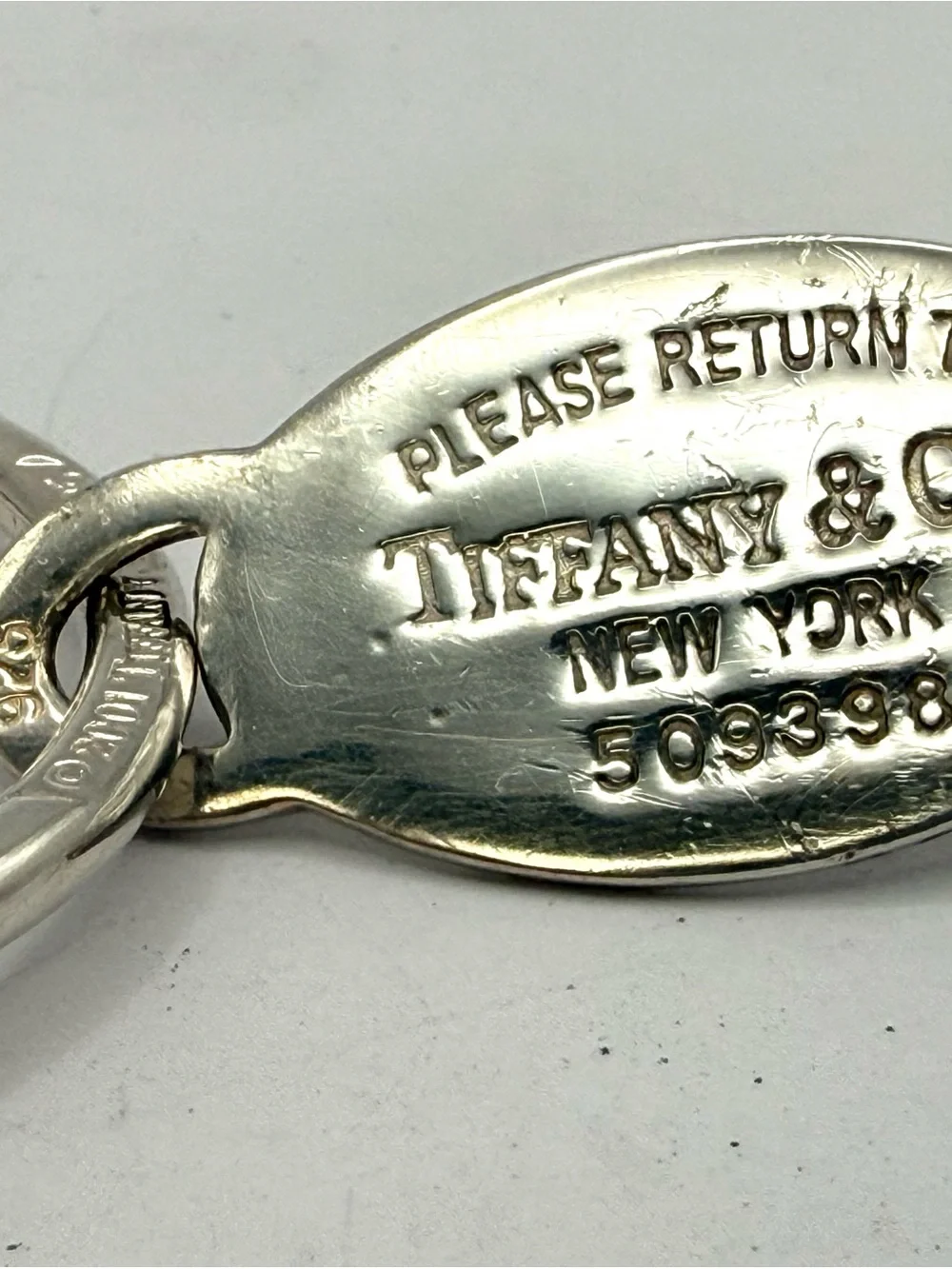 Tiffany & Co. Sterling Silver 'Please Return' Oval Tag Key Ring - Silver Large